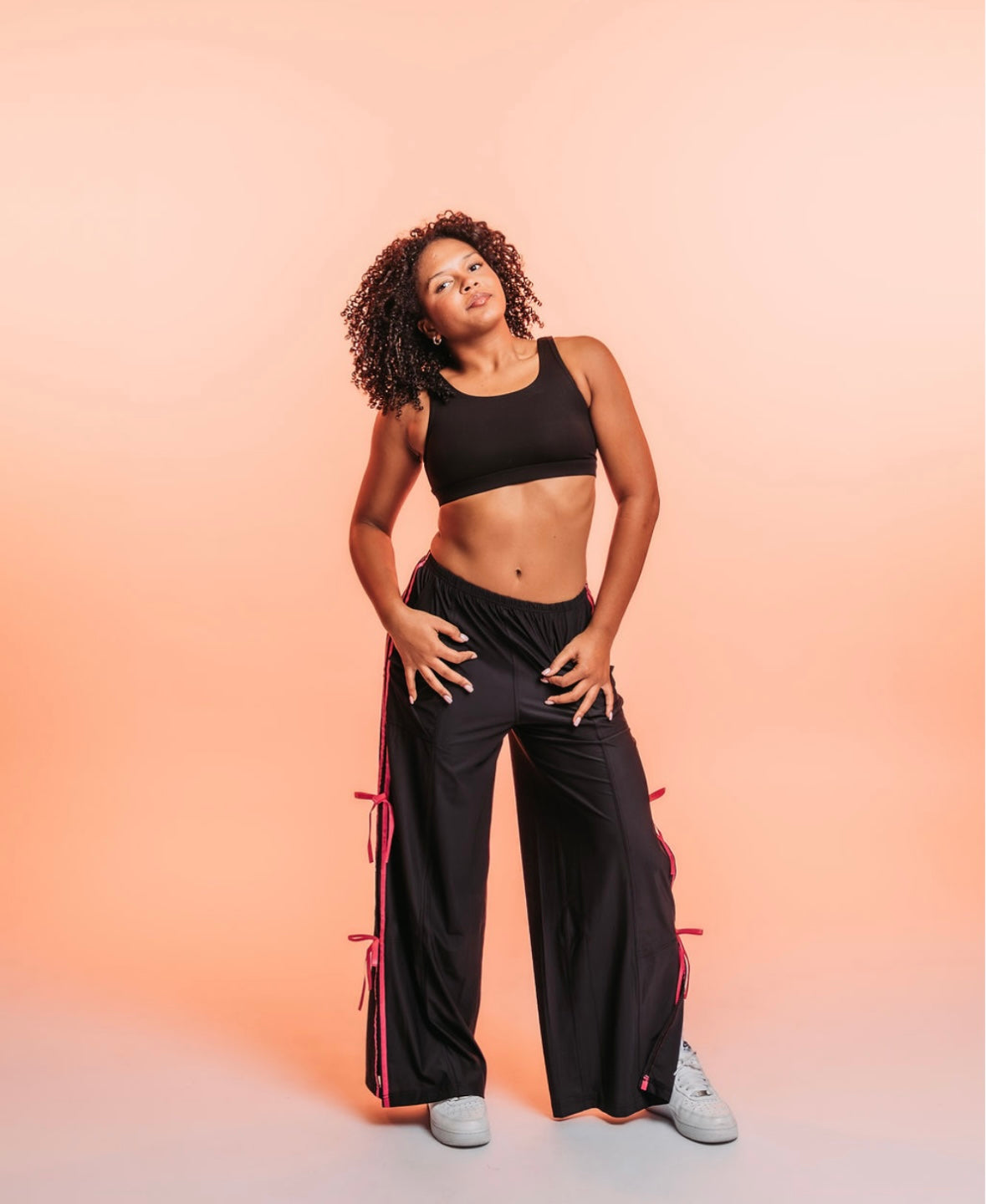 BLACK AND PINK BOW PANTS