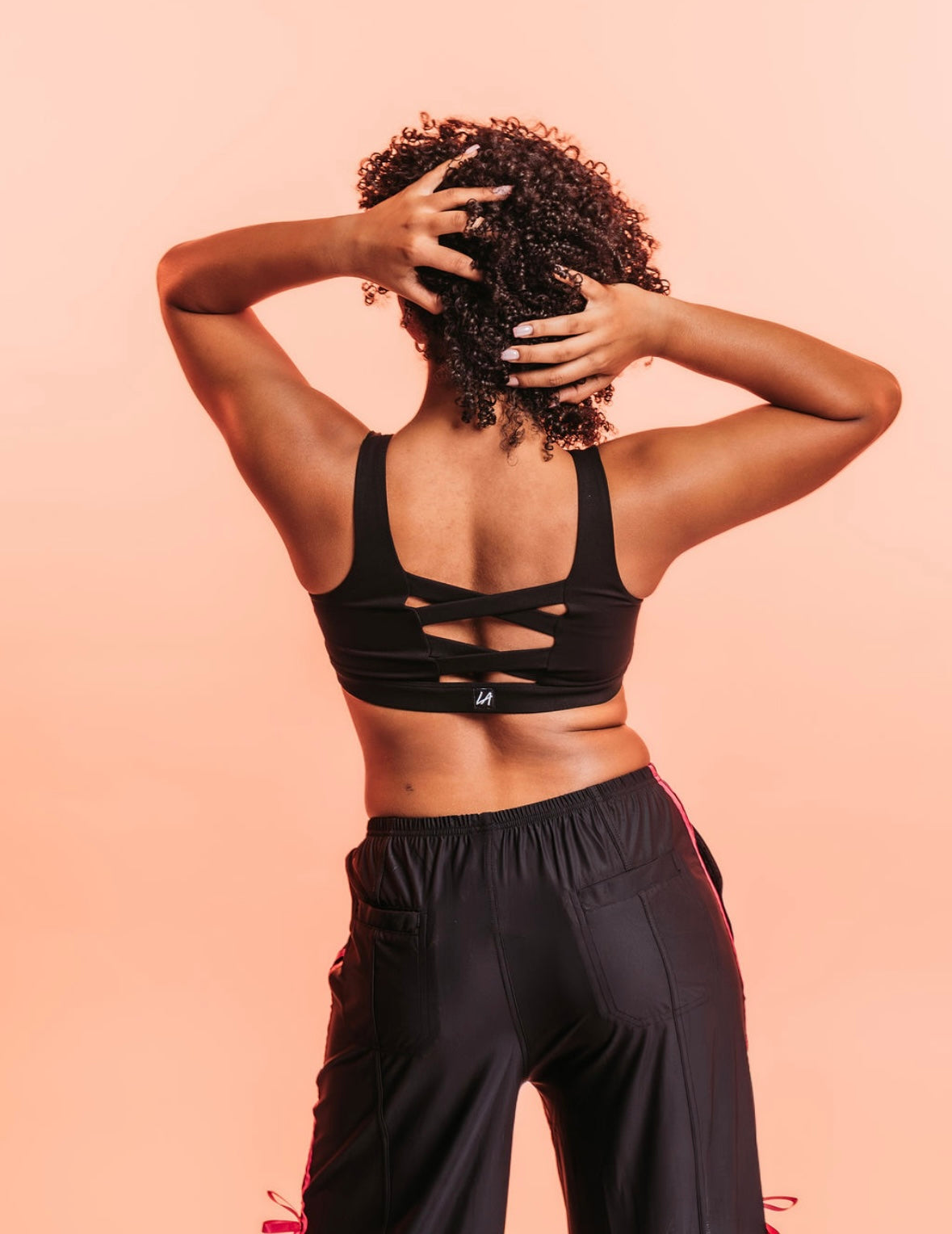 BLACK AND PINK BOW PANTS